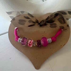 Pink Beaded Bracelet with Charms